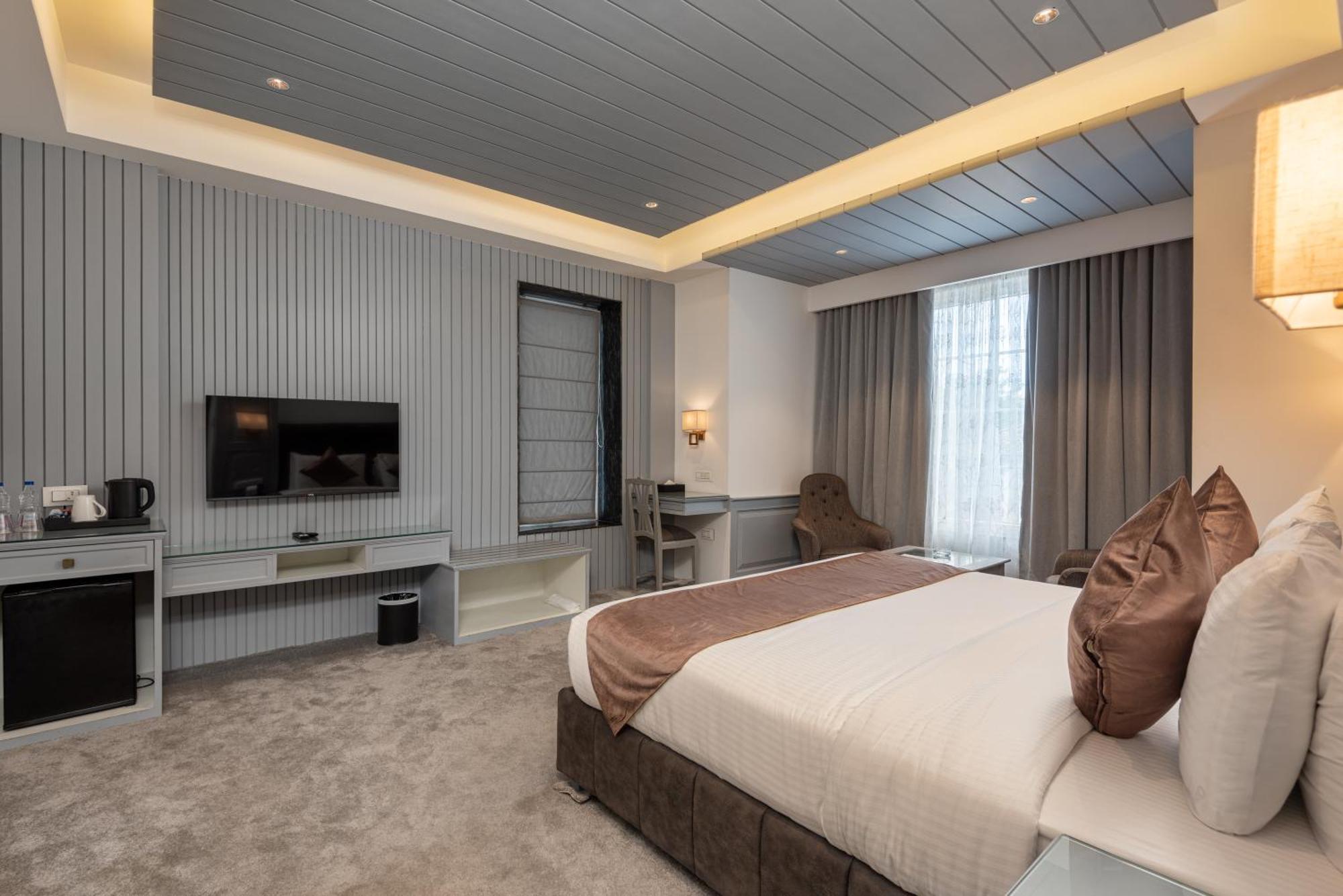 Hotel Grand Boulevard Durgjan Pokoj fotografie