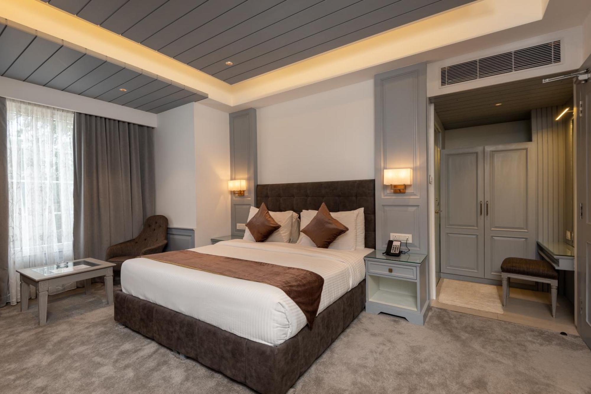 Hotel Grand Boulevard Durgjan Pokoj fotografie